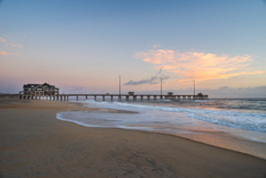 Jannette's Pier telephoto view from the beach at dawn in Nags Head, North Carolina