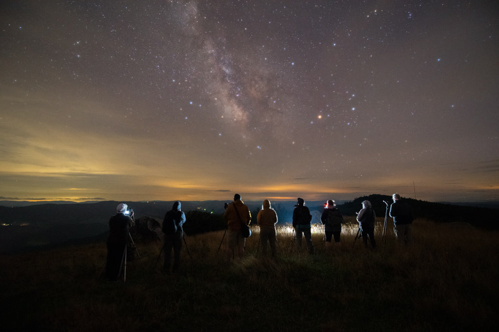 Night photography workshop at Spruce Knob in West Virginia with participants shooting the stars under the Milky Way.